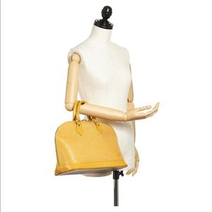 Louis Vuitton Epi Alma PM Yellow